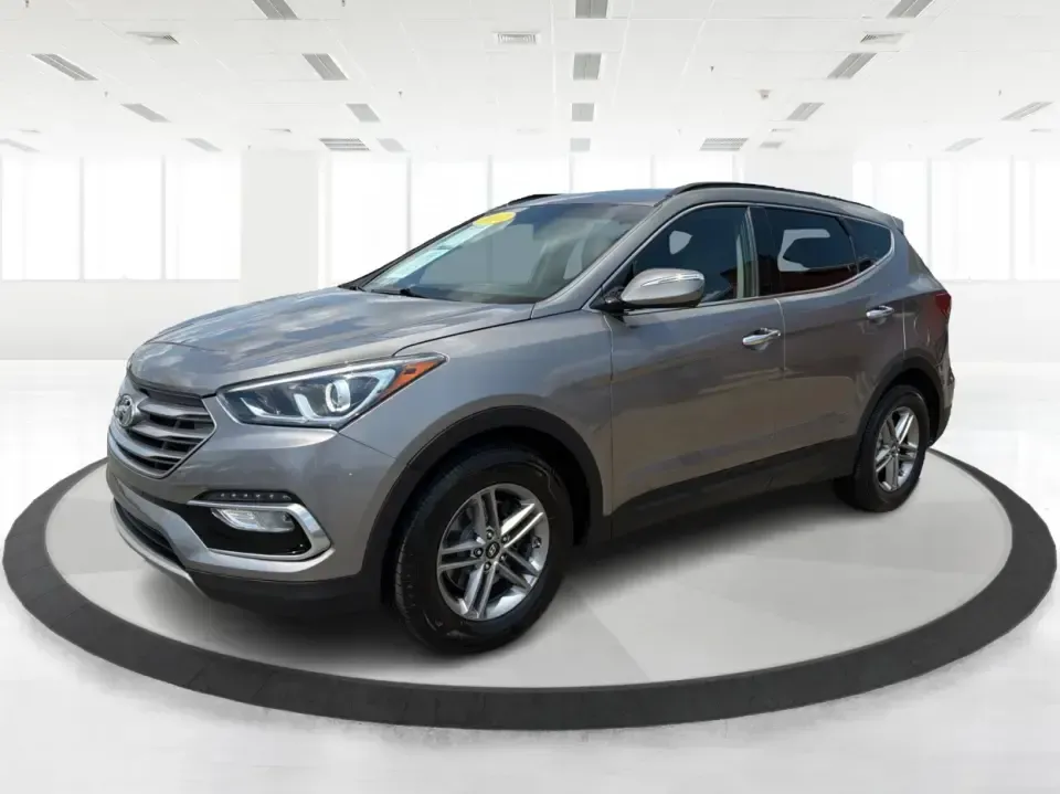 2017 Hyundai Santa Fe Sport 2.4 FWD (5XYZU3LBXHG) with an 2.4L L4 DOHC 16V engine, 6-Speed Automatic transmission, located at 1099 N County Rd 25A , Troy, OH, 45373, (937) 908-9800, 40.057079, -84.212883 - Pack the kids for school drop-off, load up groceries for the week, and still have room for a spontaneous weekend escape-this 2017 Hyundai Santa Fe Sport is built for real life in Troy, Ohio. With SUV practicality, comfortable seating, and the kind of everyday tech that makes commuting smoother, it's- Photo#8