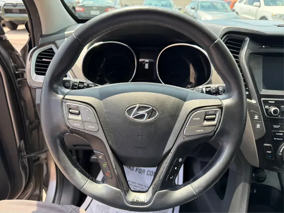 2017 Hyundai Santa Fe Sport 2.4 FWD (5XYZU3LBXHG) with an 2.4L L4 DOHC 16V engine, 6-Speed Automatic transmission, located at 1099 N County Rd 25A , Troy, OH, 45373, (937) 908-9800, 40.057079, -84.212883 - Pack the kids for school drop-off, load up groceries for the week, and still have room for a spontaneous weekend escape-this 2017 Hyundai Santa Fe Sport is built for real life in Troy, Ohio. With SUV practicality, comfortable seating, and the kind of everyday tech that makes commuting smoother, it's- Photo#15