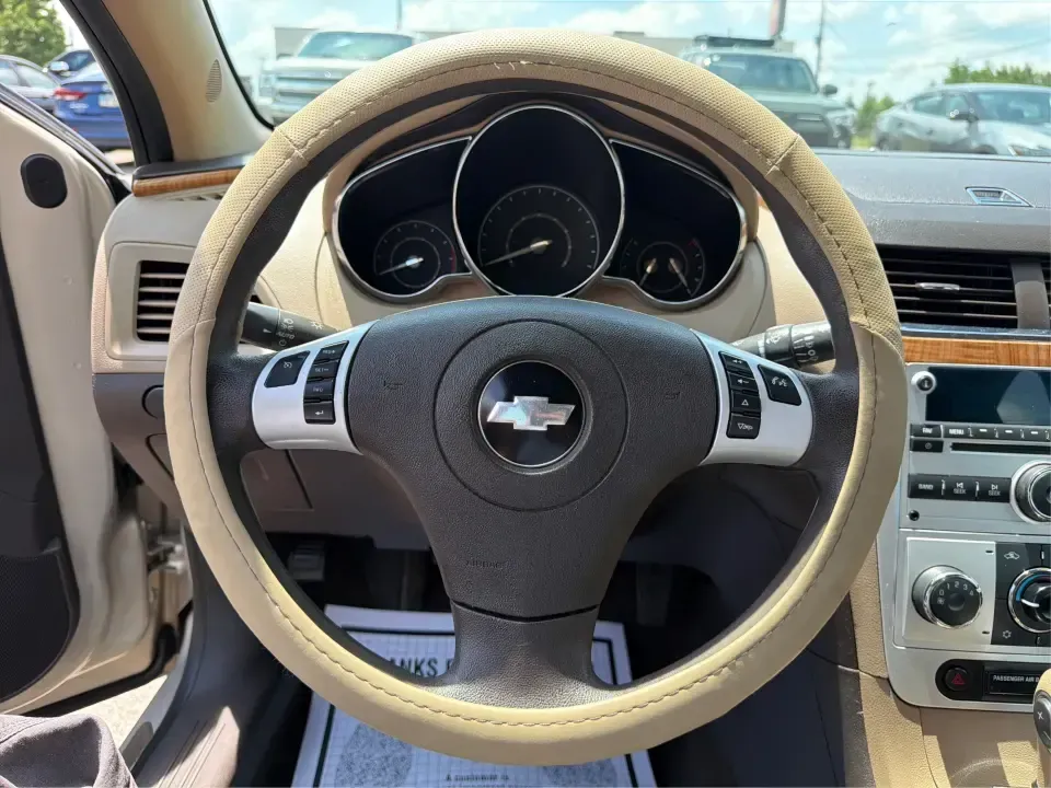 2012 Chevrolet Malibu 1LT (1G1ZC5E08CF) with an 2.4L L4 DOHC 16V engine, 6-Speed Automatic transmission, located at 4508 South Dixie Dr, Moraine, OH, 45439, (937) 908-9800, 39.689976, -84.218452 - Need a dependable sedan for the daily commute from Moraine to downtown Dayton, quick school drop-offs, or weekend runs to The Greene and Carillon Historical Park? This 2012 Chevrolet Malibu 1LT is the kind of comfortable, budget-friendly ride that fits real life-easy to park, smooth on I-75, and roo- Photo#16