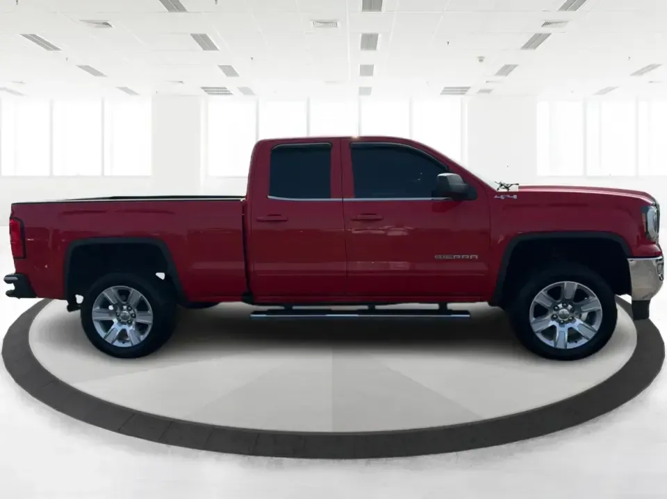 2016 GMC Sierra 1500 SLE Double Cab 4WD (1GTV2MEC4GZ) with an 5.3L V8 OHV 16V engine, 6-Speed Automatic transmission, located at 1951 S Dayton Lakeview Rd., New Carlisle, OH, 45344, (937) 908-9800, 39.890999, -84.050255 - If your weekends revolve around towing the boat to Buck Creek, hauling lumber for a home project, or packing up the family for a day at George Rogers Clark Park, this Cardinal Red 2016 GMC Sierra 1500 SLE Double Cab 4WD is the kind of truck that fits real life in New Carlisle. It's built for Ohio se- Photo#1