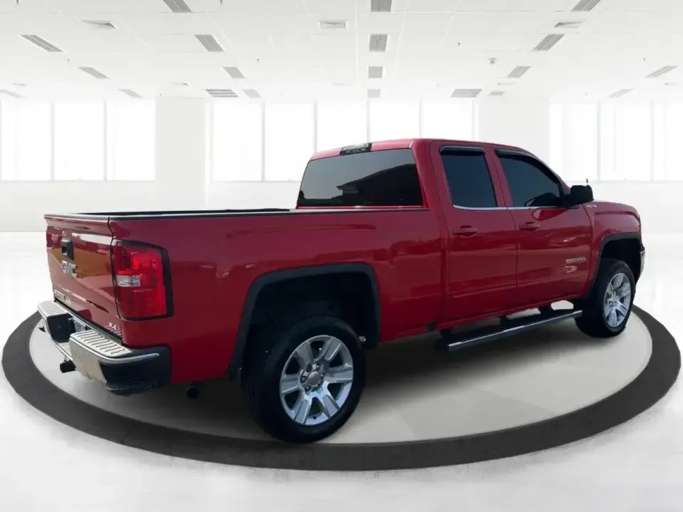 2016 GMC Sierra 1500 SLE Double Cab 4WD (1GTV2MEC4GZ) with an 5.3L V8 OHV 16V engine, 6-Speed Automatic transmission, located at 1951 S Dayton Lakeview Rd., New Carlisle, OH, 45344, (937) 908-9800, 39.890999, -84.050255 - If your weekends revolve around towing the boat to Buck Creek, hauling lumber for a home project, or packing up the family for a day at George Rogers Clark Park, this Cardinal Red 2016 GMC Sierra 1500 SLE Double Cab 4WD is the kind of truck that fits real life in New Carlisle. It's built for Ohio se- Photo#2