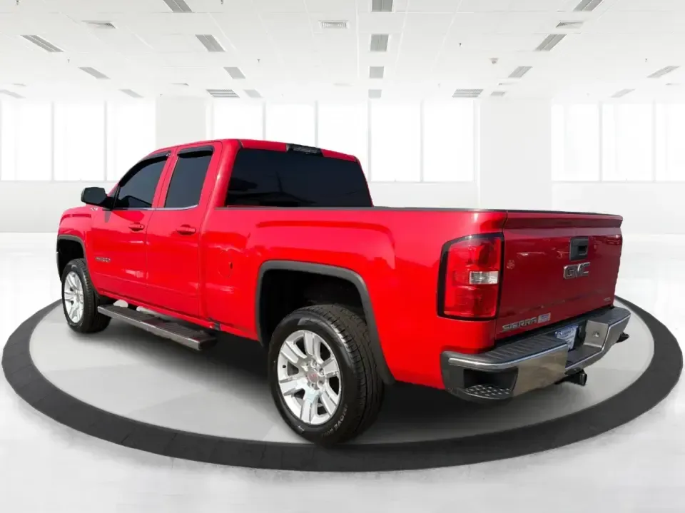 2016 GMC Sierra 1500 SLE Double Cab 4WD (1GTV2MEC4GZ) with an 5.3L V8 OHV 16V engine, 6-Speed Automatic transmission, located at 1951 S Dayton Lakeview Rd., New Carlisle, OH, 45344, (937) 908-9800, 39.890999, -84.050255 - If your weekends revolve around towing the boat to Buck Creek, hauling lumber for a home project, or packing up the family for a day at George Rogers Clark Park, this Cardinal Red 2016 GMC Sierra 1500 SLE Double Cab 4WD is the kind of truck that fits real life in New Carlisle. It's built for Ohio se- Photo#4