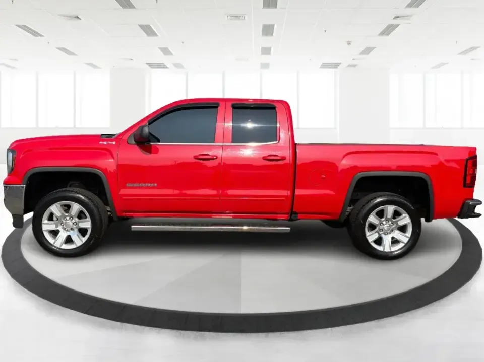 2016 GMC Sierra 1500 SLE Double Cab 4WD (1GTV2MEC4GZ) with an 5.3L V8 OHV 16V engine, 6-Speed Automatic transmission, located at 1951 S Dayton Lakeview Rd., New Carlisle, OH, 45344, (937) 908-9800, 39.890999, -84.050255 - If your weekends revolve around towing the boat to Buck Creek, hauling lumber for a home project, or packing up the family for a day at George Rogers Clark Park, this Cardinal Red 2016 GMC Sierra 1500 SLE Double Cab 4WD is the kind of truck that fits real life in New Carlisle. It's built for Ohio se- Photo#5