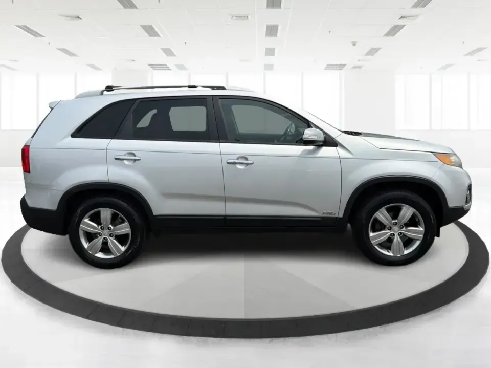 2012 Kia Sorento EX 4WD (5XYKUCA68CG) with an 2.4L L4 DOHC 16V engine, 6-Speed Automatic transmission, located at 1099 N County Rd 25A , Troy, OH, 45373, (937) 908-9800, 40.057079, -84.212883 - Weekend escapes to Caesar Creek, snowy school-drop mornings, and everyday errands up and down I75 feel a lot easier when you've got a comfortable SUV with real all-weather capability. This 2012 Kia Sorento EX 4WD is a smart pick for Troy drivers who want a practical, family-friendly ride that's equa- Photo#1