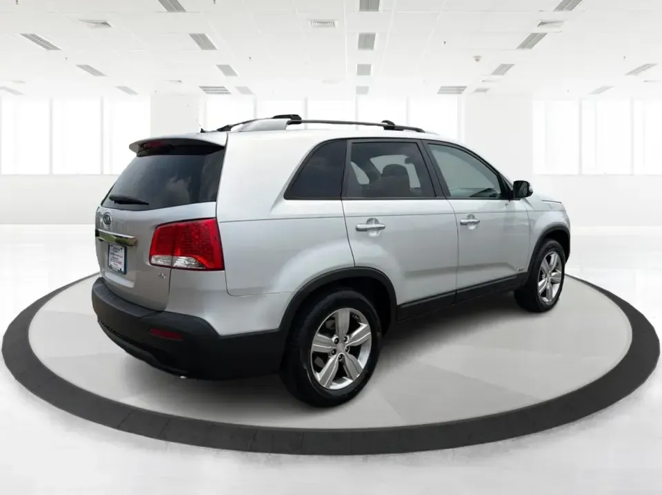 2012 Kia Sorento EX 4WD (5XYKUCA68CG) with an 2.4L L4 DOHC 16V engine, 6-Speed Automatic transmission, located at 1099 N County Rd 25A , Troy, OH, 45373, (937) 908-9800, 40.057079, -84.212883 - Weekend escapes to Caesar Creek, snowy school-drop mornings, and everyday errands up and down I75 feel a lot easier when you've got a comfortable SUV with real all-weather capability. This 2012 Kia Sorento EX 4WD is a smart pick for Troy drivers who want a practical, family-friendly ride that's equa- Photo#2