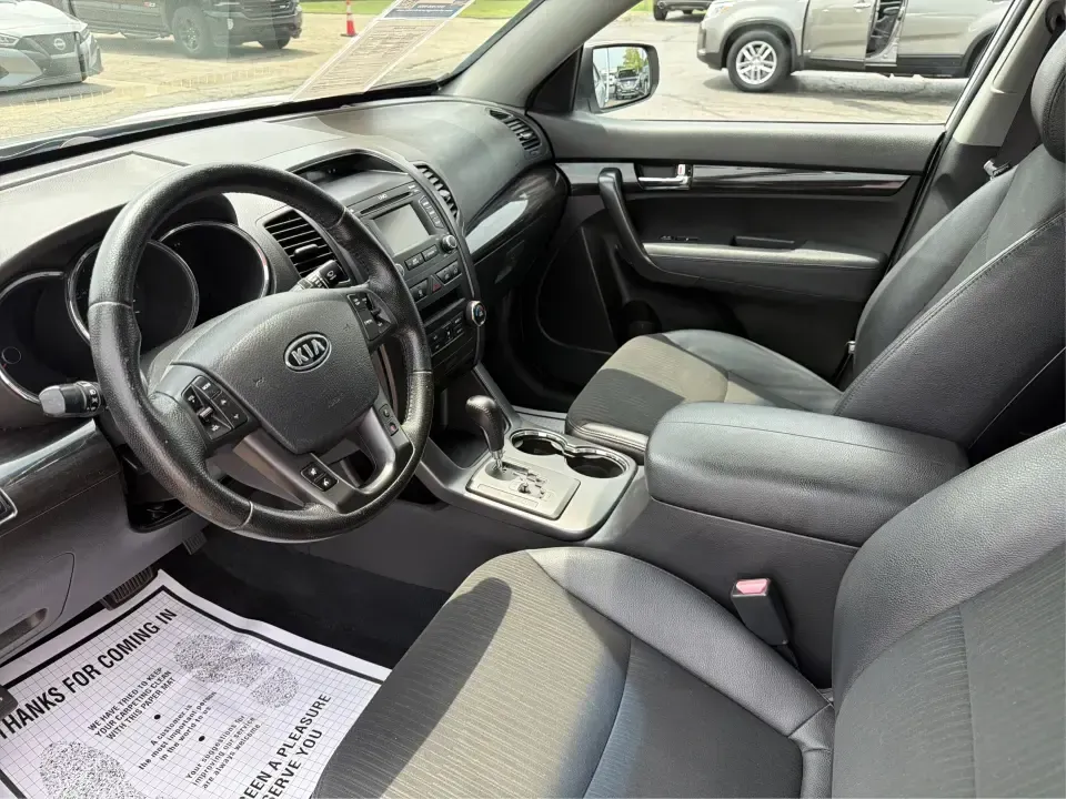 2012 Kia Sorento EX 4WD (5XYKUCA68CG) with an 2.4L L4 DOHC 16V engine, 6-Speed Automatic transmission, located at 1099 N County Rd 25A , Troy, OH, 45373, (937) 908-9800, 40.057079, -84.212883 - Weekend escapes to Caesar Creek, snowy school-drop mornings, and everyday errands up and down I75 feel a lot easier when you've got a comfortable SUV with real all-weather capability. This 2012 Kia Sorento EX 4WD is a smart pick for Troy drivers who want a practical, family-friendly ride that's equa- Photo#9