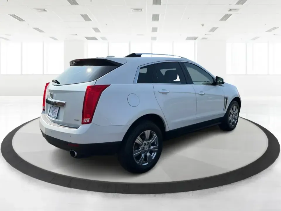 2015 Cadillac SRX Luxury Collection FWD (3GYFNBE33FS) with an 3.6L V6 DOHC 24V FFV engine, 6-Speed Automatic transmission, located at 8750 N County Rd 25A, Piqua, OH, 45356, (937) 908-9800, 40.164391, -84.232513 - Upgrade your daily drive with a luxury SUV that fits real life-school drop-offs, long commutes to Dayton, and comfortable weekend getaways up I75. This 2015 Cadillac SRX Luxury Collection FWD blends upscale style with practical space for five, making it a smart pick for growing families, busy profes- Photo#2