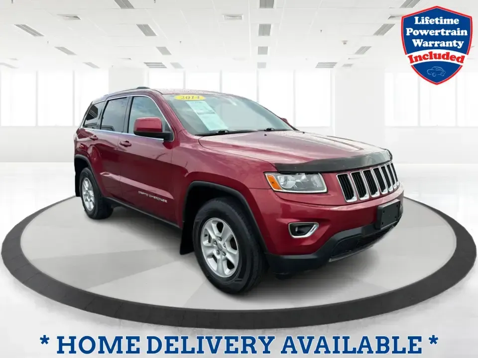 2014 Jeep Grand Cherokee Laredo 4WD (1C4RJFAG9EC) with an 3.6L V6 DOHC 24V engine, 5-Speed Automatic transmission, located at 1099 N County Rd 25A , Troy, OH, 45373, (937) 908-9800, 40.057079, -84.212883 - Picture your next Ohio weekend: the kids and gear loaded up, a cooler in the back, and you cruising out of Troy toward Charleston Falls Preserve or a fall drive through the Miami County countryside-confident that changing weather and back roads won't change your plans. This 2014 Jeep Grand Cherokee- Photo#0