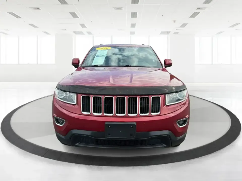 2014 Jeep Grand Cherokee Laredo 4WD (1C4RJFAG9EC) with an 3.6L V6 DOHC 24V engine, 5-Speed Automatic transmission, located at 1099 N County Rd 25A , Troy, OH, 45373, (937) 908-9800, 40.057079, -84.212883 - Picture your next Ohio weekend: the kids and gear loaded up, a cooler in the back, and you cruising out of Troy toward Charleston Falls Preserve or a fall drive through the Miami County countryside-confident that changing weather and back roads won't change your plans. This 2014 Jeep Grand Cherokee- Photo#7