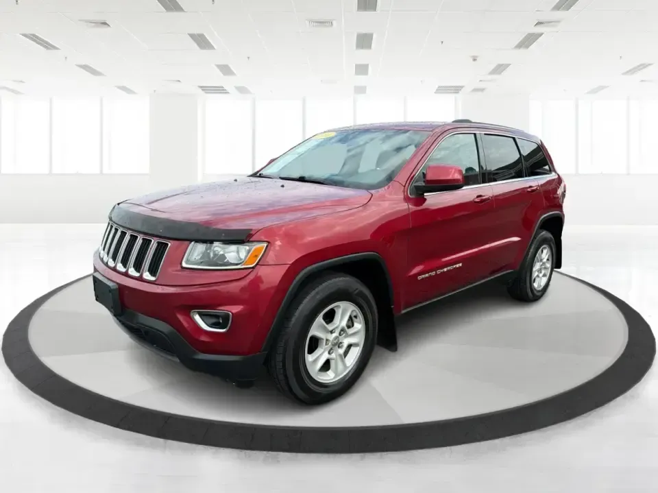2014 Jeep Grand Cherokee Laredo 4WD (1C4RJFAG9EC) with an 3.6L V6 DOHC 24V engine, 5-Speed Automatic transmission, located at 1099 N County Rd 25A , Troy, OH, 45373, (937) 908-9800, 40.057079, -84.212883 - Picture your next Ohio weekend: the kids and gear loaded up, a cooler in the back, and you cruising out of Troy toward Charleston Falls Preserve or a fall drive through the Miami County countryside-confident that changing weather and back roads won't change your plans. This 2014 Jeep Grand Cherokee- Photo#8
