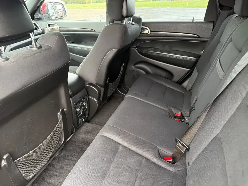 2014 Jeep Grand Cherokee Laredo 4WD (1C4RJFAG9EC) with an 3.6L V6 DOHC 24V engine, 5-Speed Automatic transmission, located at 1099 N County Rd 25A , Troy, OH, 45373, (937) 908-9800, 40.057079, -84.212883 - Picture your next Ohio weekend: the kids and gear loaded up, a cooler in the back, and you cruising out of Troy toward Charleston Falls Preserve or a fall drive through the Miami County countryside-confident that changing weather and back roads won't change your plans. This 2014 Jeep Grand Cherokee- Photo#10