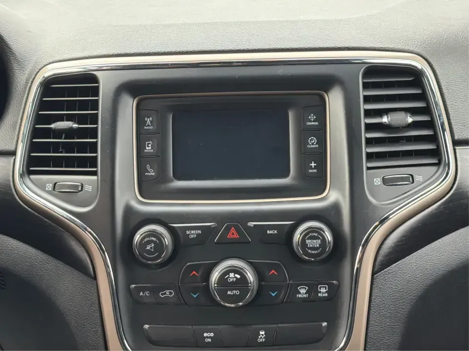 2014 Jeep Grand Cherokee Laredo 4WD (1C4RJFAG9EC) with an 3.6L V6 DOHC 24V engine, 5-Speed Automatic transmission, located at 1099 N County Rd 25A , Troy, OH, 45373, (937) 908-9800, 40.057079, -84.212883 - Picture your next Ohio weekend: the kids and gear loaded up, a cooler in the back, and you cruising out of Troy toward Charleston Falls Preserve or a fall drive through the Miami County countryside-confident that changing weather and back roads won't change your plans. This 2014 Jeep Grand Cherokee- Photo#12