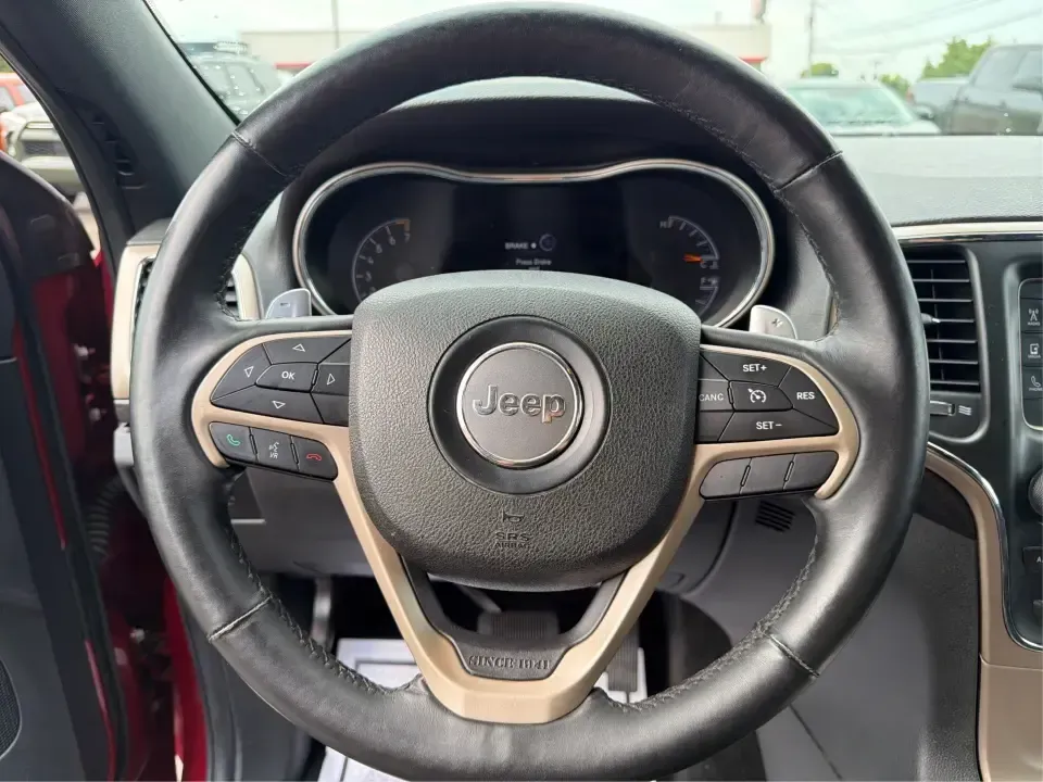 2014 Jeep Grand Cherokee Laredo 4WD (1C4RJFAG9EC) with an 3.6L V6 DOHC 24V engine, 5-Speed Automatic transmission, located at 1099 N County Rd 25A , Troy, OH, 45373, (937) 908-9800, 40.057079, -84.212883 - Picture your next Ohio weekend: the kids and gear loaded up, a cooler in the back, and you cruising out of Troy toward Charleston Falls Preserve or a fall drive through the Miami County countryside-confident that changing weather and back roads won't change your plans. This 2014 Jeep Grand Cherokee- Photo#15