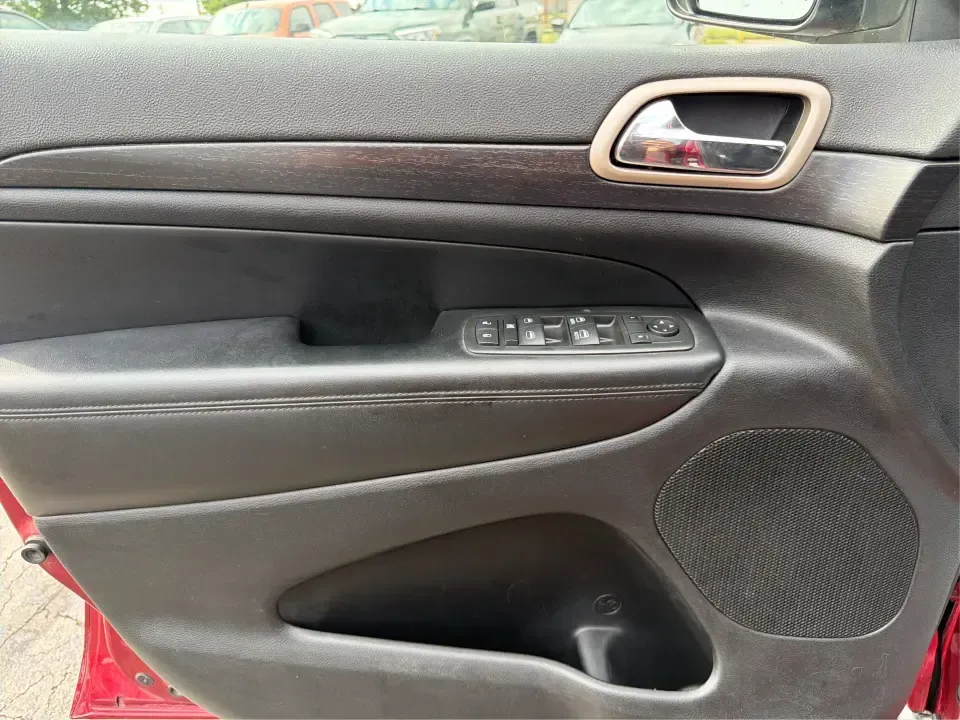 2014 Jeep Grand Cherokee Laredo 4WD (1C4RJFAG9EC) with an 3.6L V6 DOHC 24V engine, 5-Speed Automatic transmission, located at 1099 N County Rd 25A , Troy, OH, 45373, (937) 908-9800, 40.057079, -84.212883 - Picture your next Ohio weekend: the kids and gear loaded up, a cooler in the back, and you cruising out of Troy toward Charleston Falls Preserve or a fall drive through the Miami County countryside-confident that changing weather and back roads won't change your plans. This 2014 Jeep Grand Cherokee- Photo#18