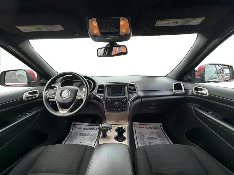 2014 Jeep Grand Cherokee Laredo 4WD (1C4RJFAG9EC) with an 3.6L V6 DOHC 24V engine, 5-Speed Automatic transmission, located at 1099 N County Rd 25A , Troy, OH, 45373, (937) 908-9800, 40.057079, -84.212883 - Picture your next Ohio weekend: the kids and gear loaded up, a cooler in the back, and you cruising out of Troy toward Charleston Falls Preserve or a fall drive through the Miami County countryside-confident that changing weather and back roads won't change your plans. This 2014 Jeep Grand Cherokee- Photo#20