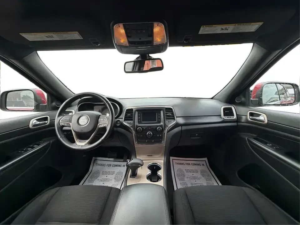 2014 Jeep Grand Cherokee Laredo 4WD (1C4RJFAG9EC) with an 3.6L V6 DOHC 24V engine, 5-Speed Automatic transmission, located at 1099 N County Rd 25A , Troy, OH, 45373, (937) 908-9800, 40.057079, -84.212883 - Picture your next Ohio weekend: the kids and gear loaded up, a cooler in the back, and you cruising out of Troy toward Charleston Falls Preserve or a fall drive through the Miami County countryside-confident that changing weather and back roads won't change your plans. This 2014 Jeep Grand Cherokee- Photo#21