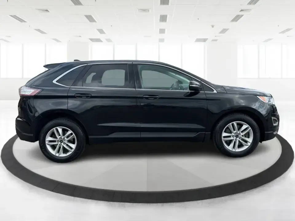 2015 Ford Edge SEL AWD (2FMTK4J92FB) with an 2.0L L4 DOHC 16V engine, 6-Speed Automatic transmission, located at 1230 East Main St, Xenia, OH, 45385, (937) 908-9800, 39.688026, -83.910172 - When your week is packed with school drop-offs, long commutes, and last-minute weekend getaways, you need an SUV that fits real life-comfortable for five, confident in Ohio weather, and ready to haul groceries, sports gear, or luggage without feeling cramped. This 2015 Ford Edge SEL AWD is a smart m- Photo#1