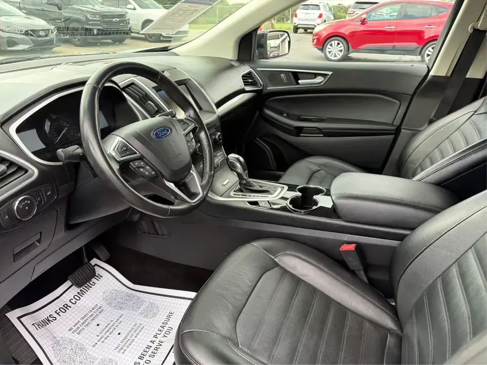 2015 Ford Edge SEL AWD (2FMTK4J92FB) with an 2.0L L4 DOHC 16V engine, 6-Speed Automatic transmission, located at 1230 East Main St, Xenia, OH, 45385, (937) 908-9800, 39.688026, -83.910172 - When your week is packed with school drop-offs, long commutes, and last-minute weekend getaways, you need an SUV that fits real life-comfortable for five, confident in Ohio weather, and ready to haul groceries, sports gear, or luggage without feeling cramped. This 2015 Ford Edge SEL AWD is a smart m- Photo#9
