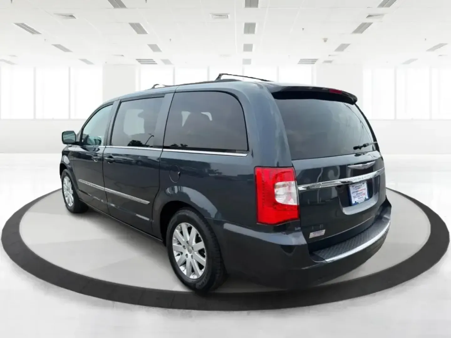 2014 Chrysler Town and Country Touring (2C4RC1BG7ER) with an 3.6L V6 DOHC 24V engine, 6-Speed Automatic transmission, located at 880 E. National Road, Vandalia, OH, 45377, (937) 908-9800, 39.891918, -84.183594 - Whether you're shuttling kids to practice, commuting up and down I-75, or packing up for a weekend at the National Museum of the U.S. Air Force, a minivan that's comfortable, capable, and easy to live with can make every day smoother. This 2014 Chrysler Town and Country Touring is built for real-l- Photo#4