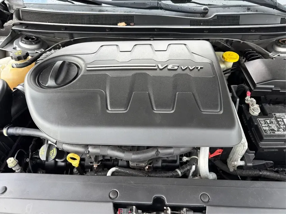 2015 Chrysler 200 S (1C3CCCBGXFN) with an 3.6L V6 DOHC 24V FFV engine, 9-Speed Automatic transmission, located at 8750 N County Rd 25A, Piqua, OH, 45356, (937) 908-9800, 40.164391, -84.232513 - Need a comfortable, stylish sedan for daily commutes up I75, quick school drop-offs, and easy weekend getaways to Troy, Sidney, or a stroll through downtown Piqua? This 2015 Chrysler 200 S is a practical, good-looking choice for drivers who want V6 power, modern tech, and a refined cabin-all in a fi- Photo#11