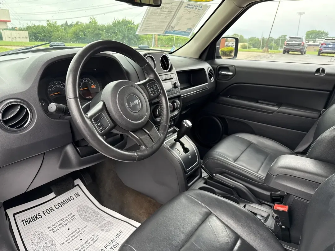 2016 Jeep Patriot High Altitude Edition (1C4NJRFB0GD) with an 2.4L I-4 DOHC engine, located at 4508 South Dixie Dr, Moraine, OH, 45439, (937) 908-9800, 39.689976, -84.218452 - 2016 Jeep Patriot High Altitude Edition - Photo#9