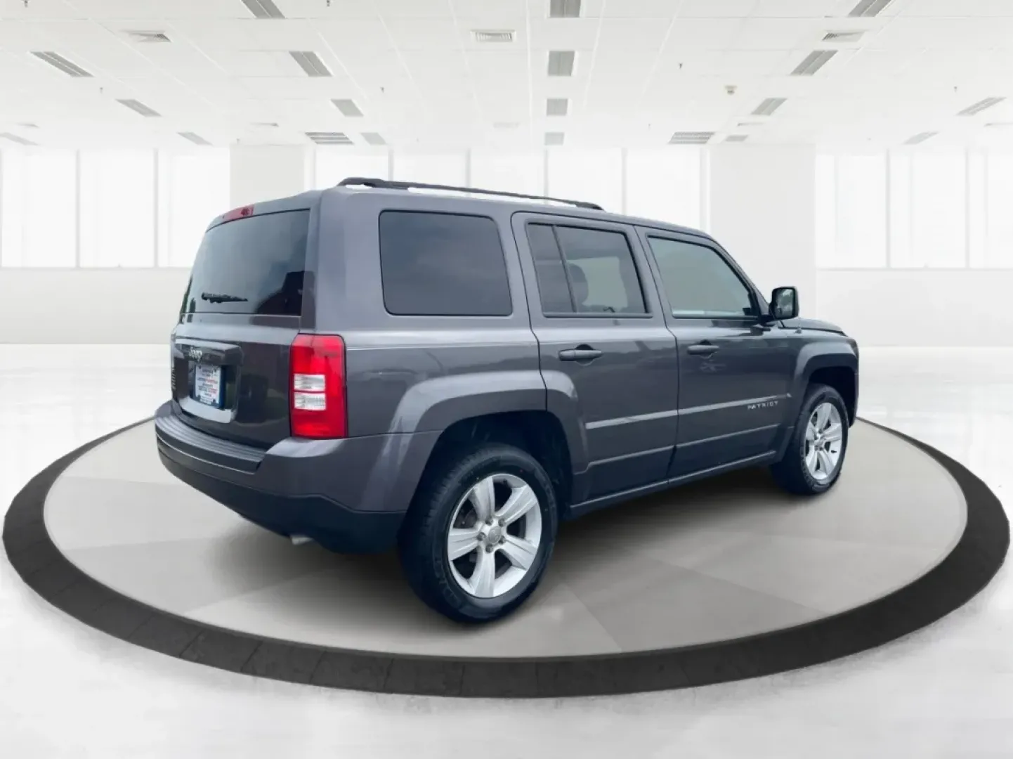 2014 Jeep Patriot Latitude 4WD (1C4NJRFB5ED) with an 2.4L L4 DOHC 16V engine, located at 880 E. National Road, Vandalia, OH, 45377, (937) 908-9800, 39.891918, -84.183594 - **Adventure Awaits with the 2014 Jeep Patriot Latitude 4WD!**<br /> <br /> If you're longing for a vehicle that blends rugged capability with everyday comfort, look no further than the 2014 Jeep Patriot Latitude 4WD. Perfect for weekend adventures or daily commutes, this SUV is designed to take you - Photo#2