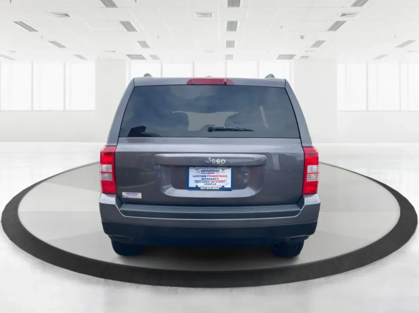 2014 Jeep Patriot Latitude 4WD (1C4NJRFB5ED) with an 2.4L L4 DOHC 16V engine, located at 880 E. National Road, Vandalia, OH, 45377, (937) 908-9800, 39.891918, -84.183594 - **Adventure Awaits with the 2014 Jeep Patriot Latitude 4WD!**<br /> <br /> If you're longing for a vehicle that blends rugged capability with everyday comfort, look no further than the 2014 Jeep Patriot Latitude 4WD. Perfect for weekend adventures or daily commutes, this SUV is designed to take you - Photo#3