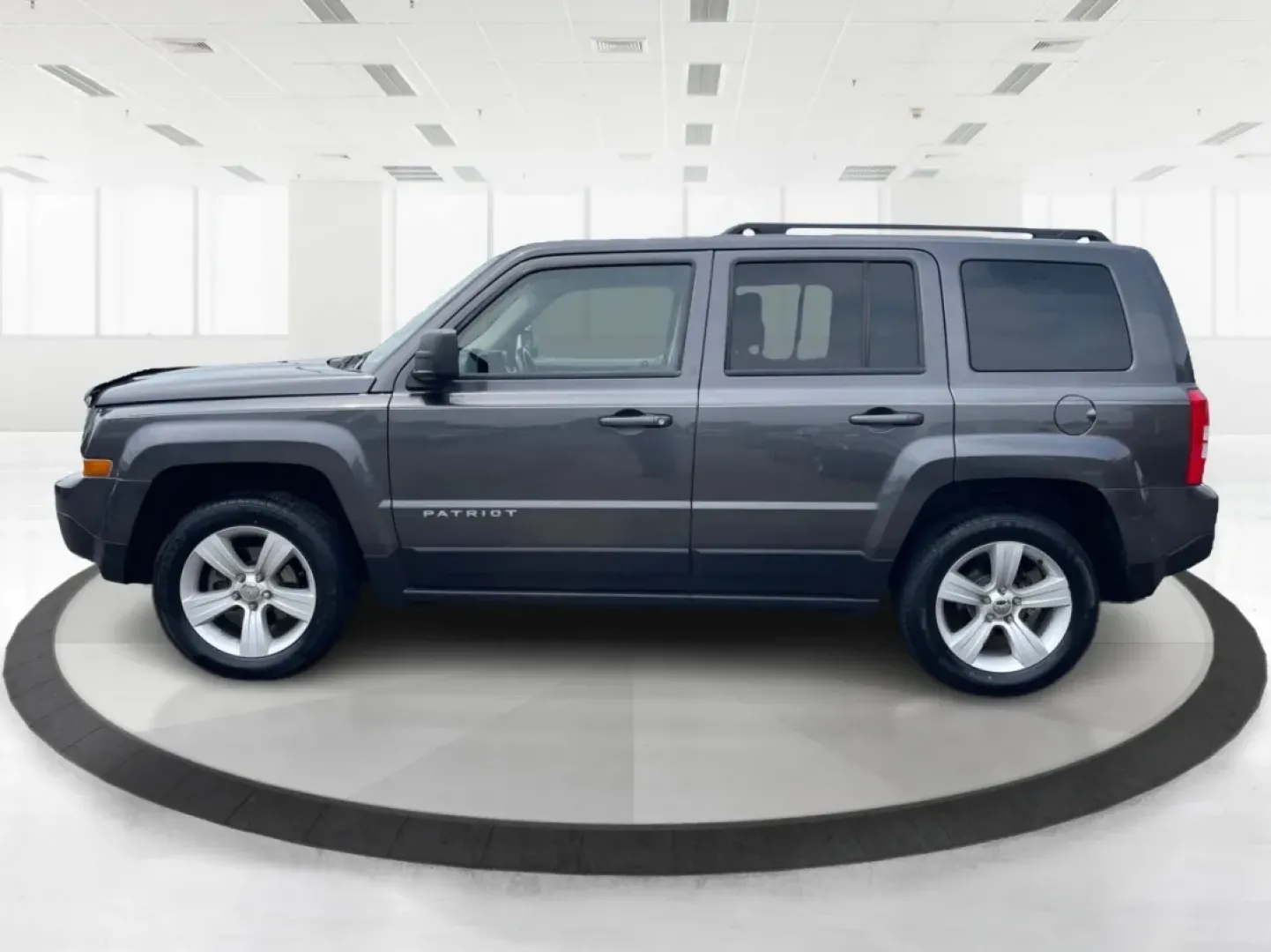 2014 Jeep Patriot Latitude 4WD (1C4NJRFB5ED) with an 2.4L L4 DOHC 16V engine, located at 880 E. National Road, Vandalia, OH, 45377, (937) 908-9800, 39.891918, -84.183594 - **Adventure Awaits with the 2014 Jeep Patriot Latitude 4WD!**<br /> <br /> If you're longing for a vehicle that blends rugged capability with everyday comfort, look no further than the 2014 Jeep Patriot Latitude 4WD. Perfect for weekend adventures or daily commutes, this SUV is designed to take you - Photo#5
