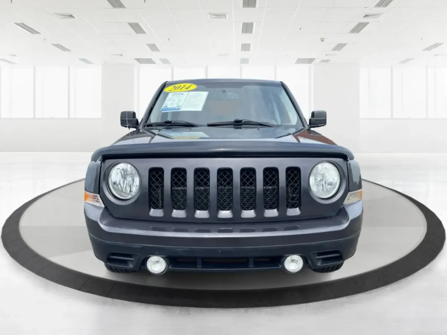 2014 Jeep Patriot Latitude 4WD (1C4NJRFB5ED) with an 2.4L L4 DOHC 16V engine, located at 880 E. National Road, Vandalia, OH, 45377, (937) 908-9800, 39.891918, -84.183594 - **Adventure Awaits with the 2014 Jeep Patriot Latitude 4WD!**<br /> <br /> If you're longing for a vehicle that blends rugged capability with everyday comfort, look no further than the 2014 Jeep Patriot Latitude 4WD. Perfect for weekend adventures or daily commutes, this SUV is designed to take you - Photo#7