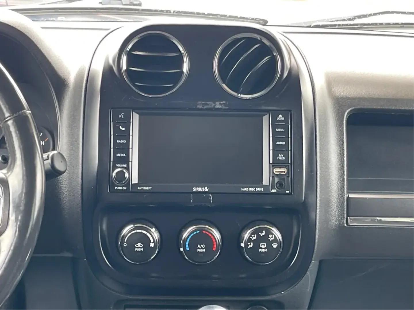 2014 Jeep Patriot Latitude 4WD (1C4NJRFB5ED) with an 2.4L L4 DOHC 16V engine, located at 1230 East Main St, Xenia, OH, 45385, (937) 908-9800, 39.688026, -83.910172 - **Adventure Awaits with the 2014 Jeep Patriot Latitude 4WD!**<br /> <br /> If you're longing for a vehicle that blends rugged capability with everyday comfort, look no further than the 2014 Jeep Patriot Latitude 4WD. Perfect for weekend adventures or daily commutes, this SUV is designed to take you - Photo#5