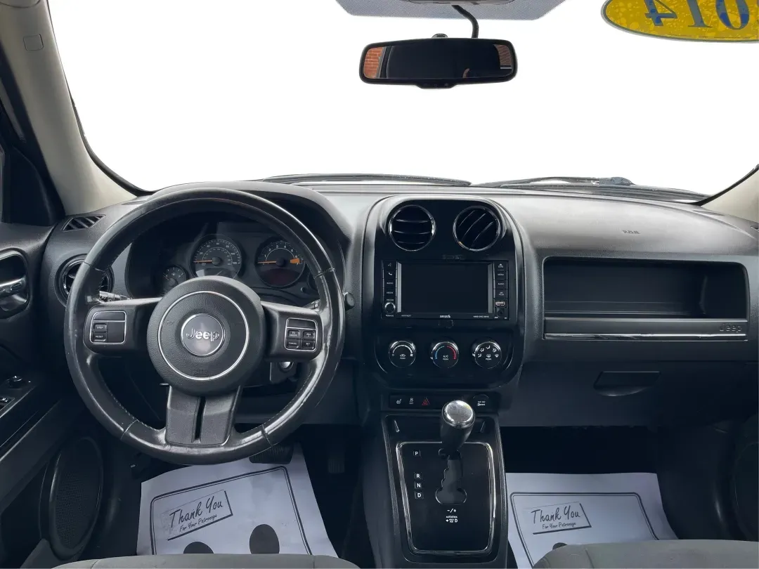 2014 Jeep Patriot Latitude 4WD (1C4NJRFB5ED) with an 2.4L L4 DOHC 16V engine, located at 1230 East Main St, Xenia, OH, 45385, (937) 908-9800, 39.688026, -83.910172 - **Adventure Awaits with the 2014 Jeep Patriot Latitude 4WD!**<br /> <br /> If you're longing for a vehicle that blends rugged capability with everyday comfort, look no further than the 2014 Jeep Patriot Latitude 4WD. Perfect for weekend adventures or daily commutes, this SUV is designed to take you - Photo#13