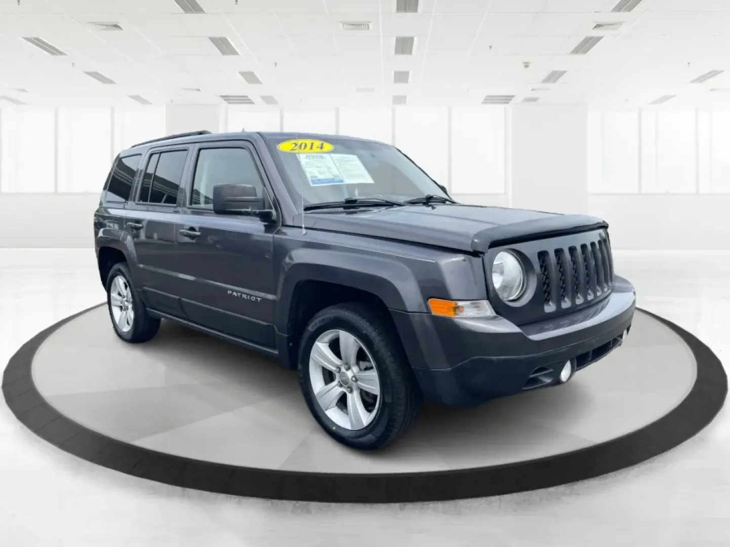 2014 Jeep Patriot Latitude 4WD (1C4NJRFB5ED) with an 2.4L L4 DOHC 16V engine, located at 1230 East Main St, Xenia, OH, 45385, (937) 908-9800, 39.688026, -83.910172 - **Adventure Awaits with the 2014 Jeep Patriot Latitude 4WD!**<br /> <br /> If you're longing for a vehicle that blends rugged capability with everyday comfort, look no further than the 2014 Jeep Patriot Latitude 4WD. Perfect for weekend adventures or daily commutes, this SUV is designed to take you - Photo#13