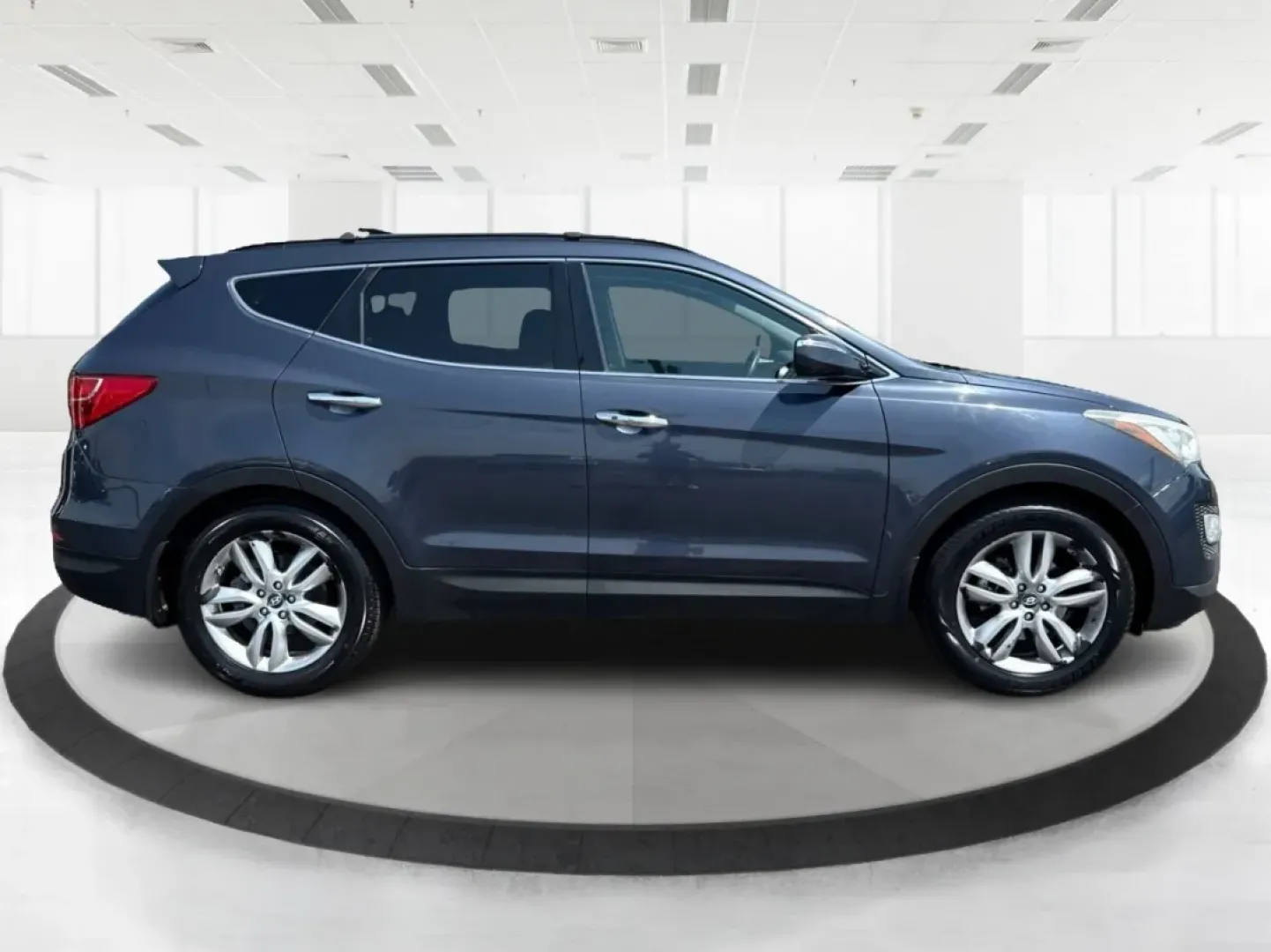 2013 Hyundai Santa Fe Sport 2.0T (5XYZU3LA1DG) with an Theta II 2L I-4 gasoline direct injection engine, located at 880 E. National Road, Vandalia, OH, 45377, (937) 908-9800, 39.891918, -84.183594 - **Discover Adventure with the 2013 Hyundai Santa Fe at Advantage Car and Credit!**<br /> <br /> Are you ready to embrace the open road? Whether you're planning a weekend getaway or commuting to work, the 2013 Hyundai Santa Fe Sport 2.0T is the perfect vehicle to elevate your lifestyle. Designed for - Photo#1