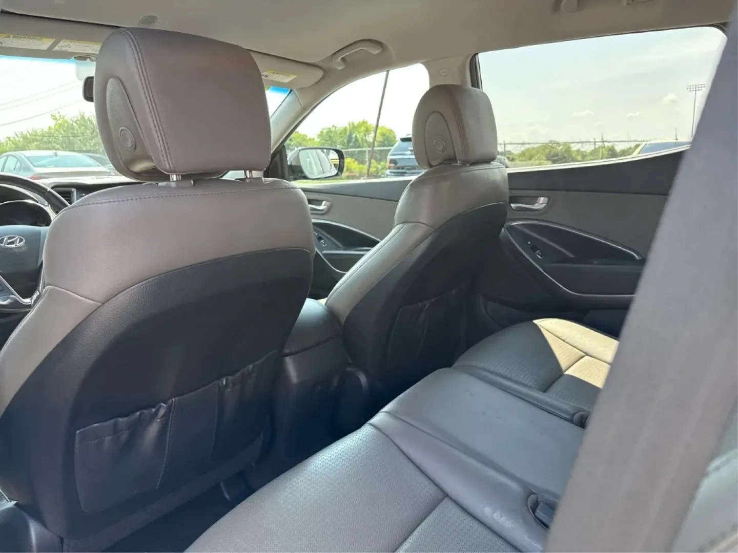 2013 Hyundai Santa Fe Sport 2.0T (5XYZU3LA1DG) with an Theta II 2L I-4 gasoline direct injection engine, located at 880 E. National Road, Vandalia, OH, 45377, (937) 908-9800, 39.891918, -84.183594 - **Discover Adventure with the 2013 Hyundai Santa Fe at Advantage Car and Credit!**<br /> <br /> Are you ready to embrace the open road? Whether you're planning a weekend getaway or commuting to work, the 2013 Hyundai Santa Fe Sport 2.0T is the perfect vehicle to elevate your lifestyle. Designed for - Photo#10