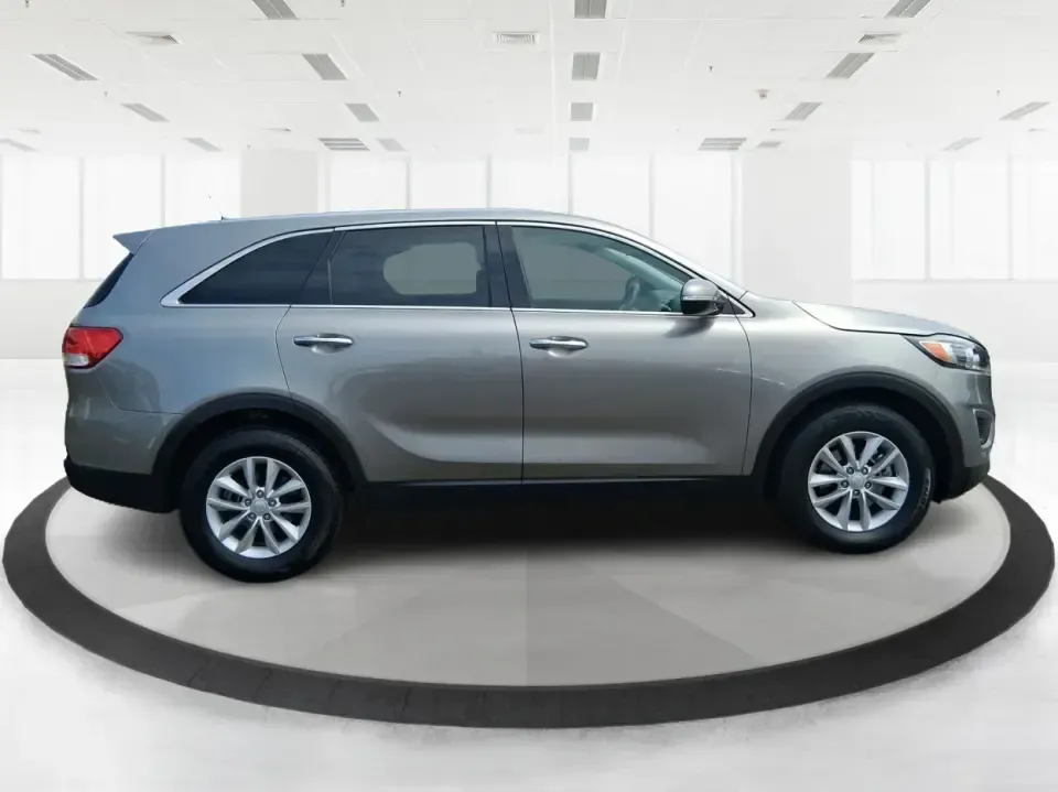 2017 Kia Sorento 2.4L L (5XYPG4A32HG) with an 2.4L I-4 gasoline direct injection engine, 6A transmission, located at 880 E. National Road, Vandalia, OH, 45377, (937) 908-9800, 39.891918, -84.183594 - Picture your next road trip or daily school-and-sports shuffle: a roomy SUV that's comfortable on long stretches of I-75, easy to live with around town, and ready for weekend errands from Miller Lane to the Dayton area. This **2017 Kia Sorento 2.4L L** in **Gray** is a practical, budget-friendly cho - Photo#1