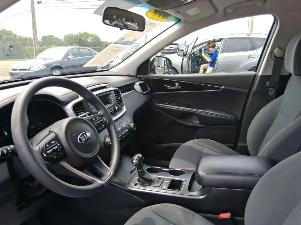 2017 Kia Sorento 2.4L L (5XYPG4A32HG) with an 2.4L I-4 gasoline direct injection engine, 6A transmission, located at 880 E. National Road, Vandalia, OH, 45377, (937) 908-9800, 39.891918, -84.183594 - Picture your next road trip or daily school-and-sports shuffle: a roomy SUV that's comfortable on long stretches of I-75, easy to live with around town, and ready for weekend errands from Miller Lane to the Dayton area. This **2017 Kia Sorento 2.4L L** in **Gray** is a practical, budget-friendly cho - Photo#9