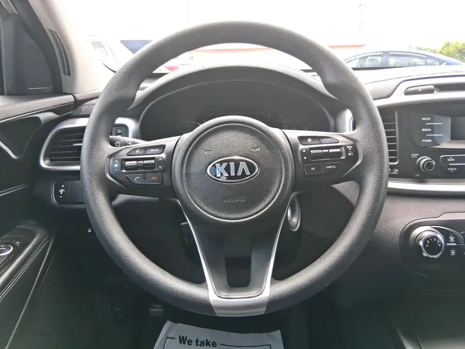 2017 Kia Sorento 2.4L L (5XYPG4A32HG) with an 2.4L I-4 gasoline direct injection engine, 6A transmission, located at 880 E. National Road, Vandalia, OH, 45377, (937) 908-9800, 39.891918, -84.183594 - Picture your next road trip or daily school-and-sports shuffle: a roomy SUV that's comfortable on long stretches of I-75, easy to live with around town, and ready for weekend errands from Miller Lane to the Dayton area. This **2017 Kia Sorento 2.4L L** in **Gray** is a practical, budget-friendly cho - Photo#16