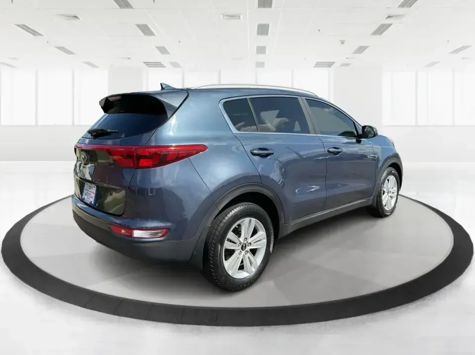 2017 Kia Sportage LX FWD (KNDPM3ACXH7) with an 2.4L V6 DOHC 24V engine, 6A transmission, located at 1230 East Main St, Xenia, OH, 45385, (937) 908-9800, 39.688026, -83.910172 - Picture your next week: an easy school drop-off, a smooth commute down US-35, and a Saturday escape to Caesar Creek State Park with room for everyone and everything. This 2017 Kia Sportage LX FWD in eye-catching Pacific Blue is the kind of practical, comfortable crossover that fits real life in Xeni- Photo#2
