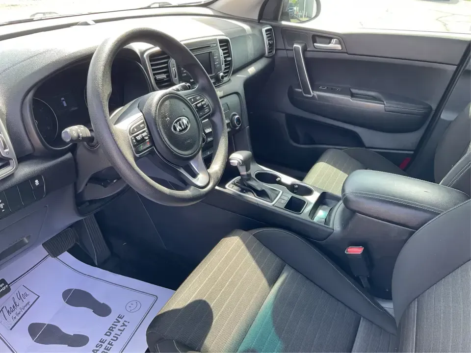 2017 Kia Sportage LX FWD (KNDPM3ACXH7) with an 2.4L V6 DOHC 24V engine, 6A transmission, located at 1230 East Main St, Xenia, OH, 45385, (937) 908-9800, 39.688026, -83.910172 - Picture your next week: an easy school drop-off, a smooth commute down US-35, and a Saturday escape to Caesar Creek State Park with room for everyone and everything. This 2017 Kia Sportage LX FWD in eye-catching Pacific Blue is the kind of practical, comfortable crossover that fits real life in Xeni- Photo#9