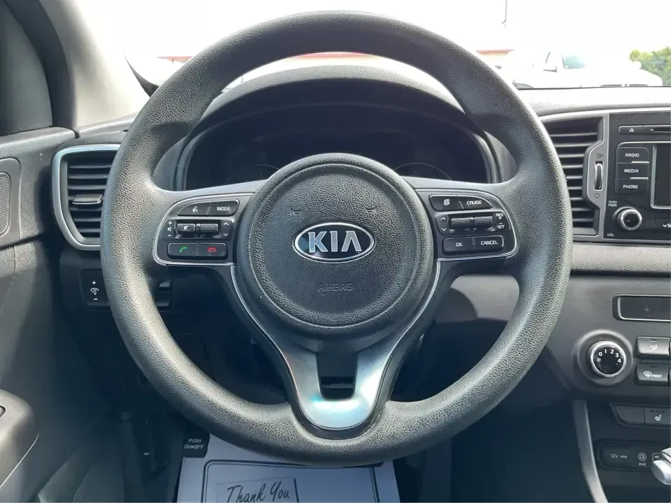 2017 Kia Sportage LX FWD (KNDPM3ACXH7) with an 2.4L V6 DOHC 24V engine, 6A transmission, located at 1230 East Main St, Xenia, OH, 45385, (937) 908-9800, 39.688026, -83.910172 - Picture your next week: an easy school drop-off, a smooth commute down US-35, and a Saturday escape to Caesar Creek State Park with room for everyone and everything. This 2017 Kia Sportage LX FWD in eye-catching Pacific Blue is the kind of practical, comfortable crossover that fits real life in Xeni- Photo#16