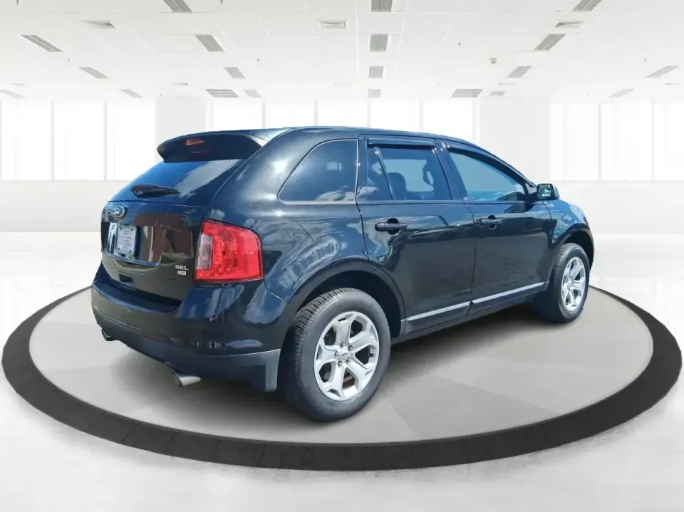 2013 Ford Edge SEL (2FMDK4JC1DB) with an 3.5L V-6 DOHC engine, 6-Speed Automatic transmission, located at 1184 Kauffman Ave, Fairborn, OH, 45324, (937) 908-9800, 39.807072, -84.030914 - **Elevate Your Weekend Adventures with the 2013 Ford Edge SEL at Advantage Car and Credit!**<br /> <br /> Are you ready to embrace a lifestyle of comfort and adventure? Whether you're shuttling the kids to their weekend soccer games or embarking on a scenic road trip through Ohio's beautiful landsca - Photo#2