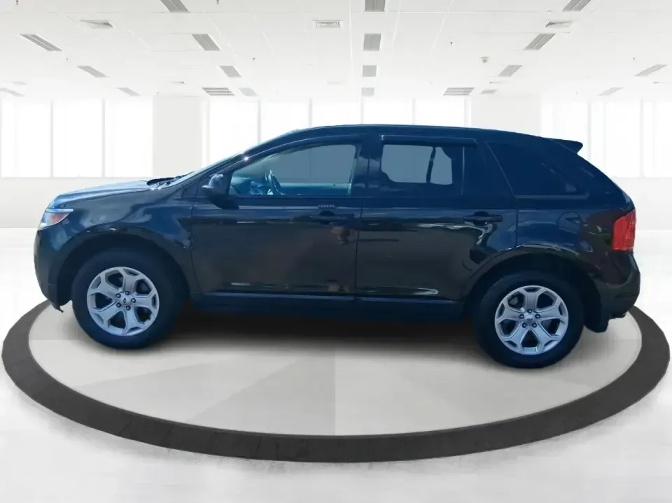 2013 Ford Edge SEL (2FMDK4JC1DB) with an 3.5L V-6 DOHC engine, 6-Speed Automatic transmission, located at 1184 Kauffman Ave, Fairborn, OH, 45324, (937) 908-9800, 39.807072, -84.030914 - **Elevate Your Weekend Adventures with the 2013 Ford Edge SEL at Advantage Car and Credit!**<br /> <br /> Are you ready to embrace a lifestyle of comfort and adventure? Whether you're shuttling the kids to their weekend soccer games or embarking on a scenic road trip through Ohio's beautiful landsca - Photo#5