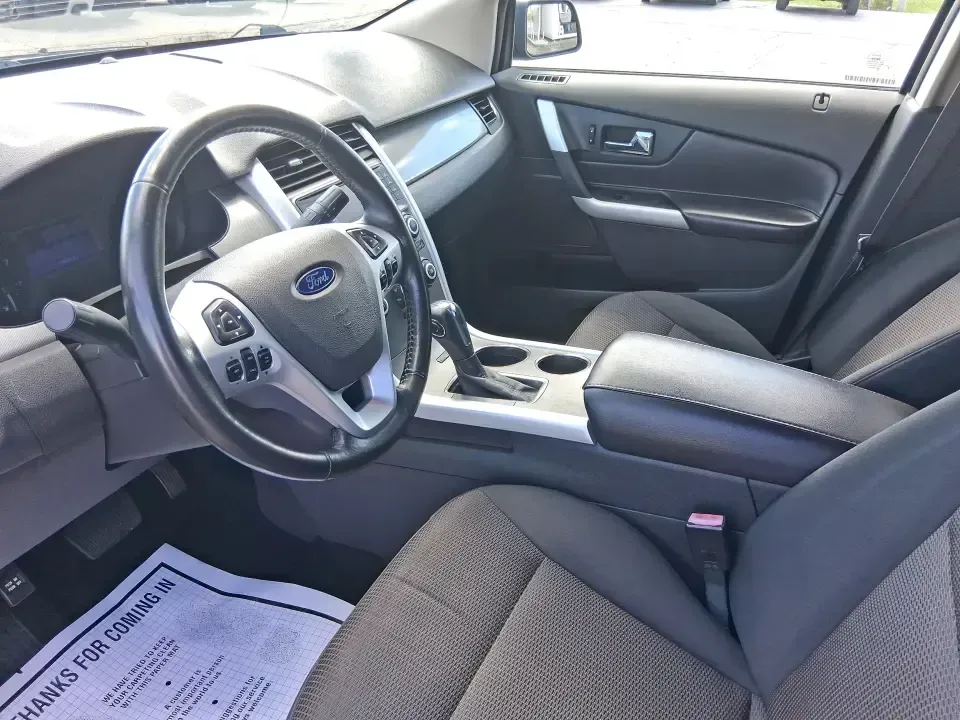 2013 Ford Edge SEL (2FMDK4JC1DB) with an 3.5L V-6 DOHC engine, 6-Speed Automatic transmission, located at 1184 Kauffman Ave, Fairborn, OH, 45324, (937) 908-9800, 39.807072, -84.030914 - **Elevate Your Weekend Adventures with the 2013 Ford Edge SEL at Advantage Car and Credit!**<br /> <br /> Are you ready to embrace a lifestyle of comfort and adventure? Whether you're shuttling the kids to their weekend soccer games or embarking on a scenic road trip through Ohio's beautiful landsca - Photo#9