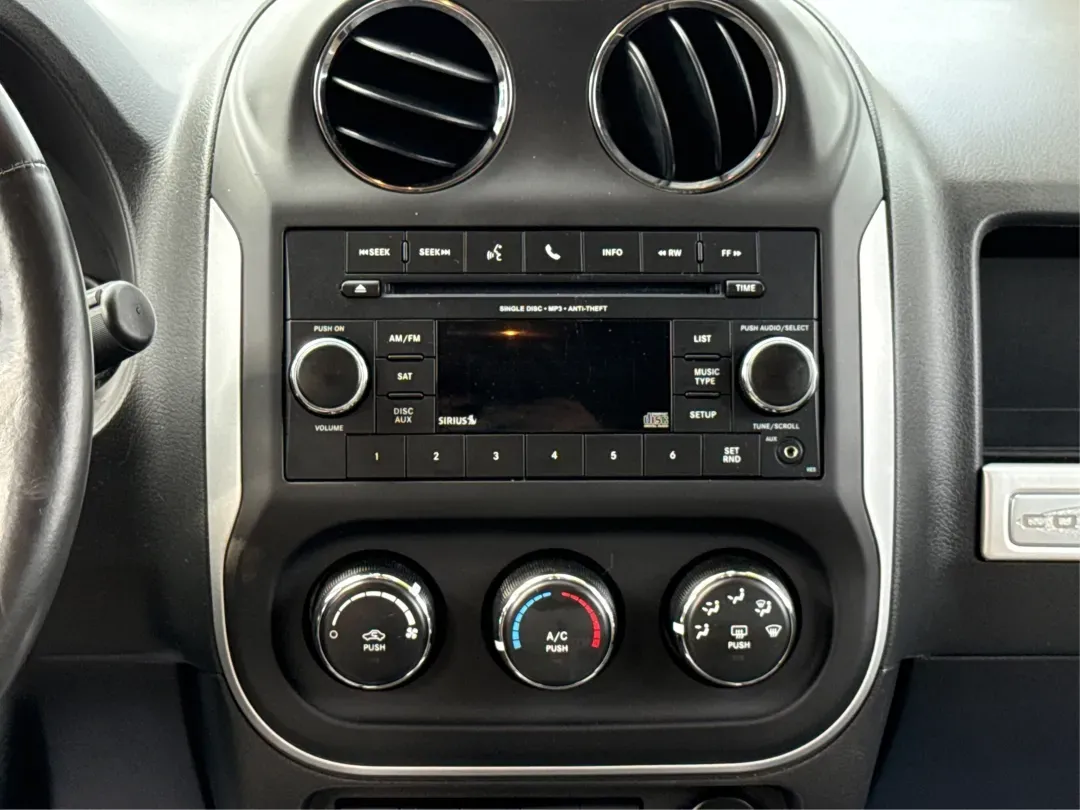 2014 Jeep Compass Latitude (1C4NJDEBXED) with an 2.4L I-4 DOHC engine, located at 1230 East Main St, Xenia, OH, 45385, (937) 908-9800, 39.688026, -83.910172 - **Discover Your Adventure with the 2014 Jeep Compass Latitude Perfect for Family Road Trips or Daily Commutes!**<br /> <br /> Are you ready to elevate your driving experience? The 2014 Jeep Compass Latitude is not just a vehicle; it's a lifestyle. Whether you're navigating busy city streets in Fair - Photo#13