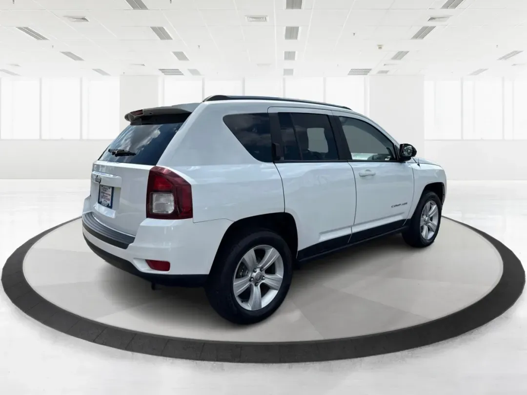 2014 Jeep Compass Sport (1C4NJDBB4ED) with an 2.4L I-4 DOHC engine, located at 1230 East Main St, Xenia, OH, 45385, (937) 908-9800, 39.688026, -83.910172 - 2014 Jeep Compass Sport - Photo#2