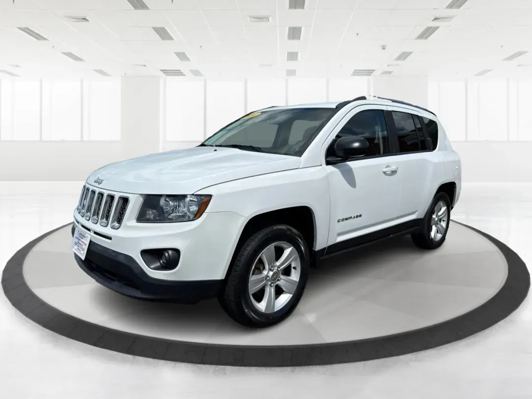 2014 Jeep Compass Sport (1C4NJDBB4ED) with an 2.4L I-4 DOHC engine, located at 1230 East Main St, Xenia, OH, 45385, (937) 908-9800, 39.688026, -83.910172 - 2014 Jeep Compass Sport - Photo#8