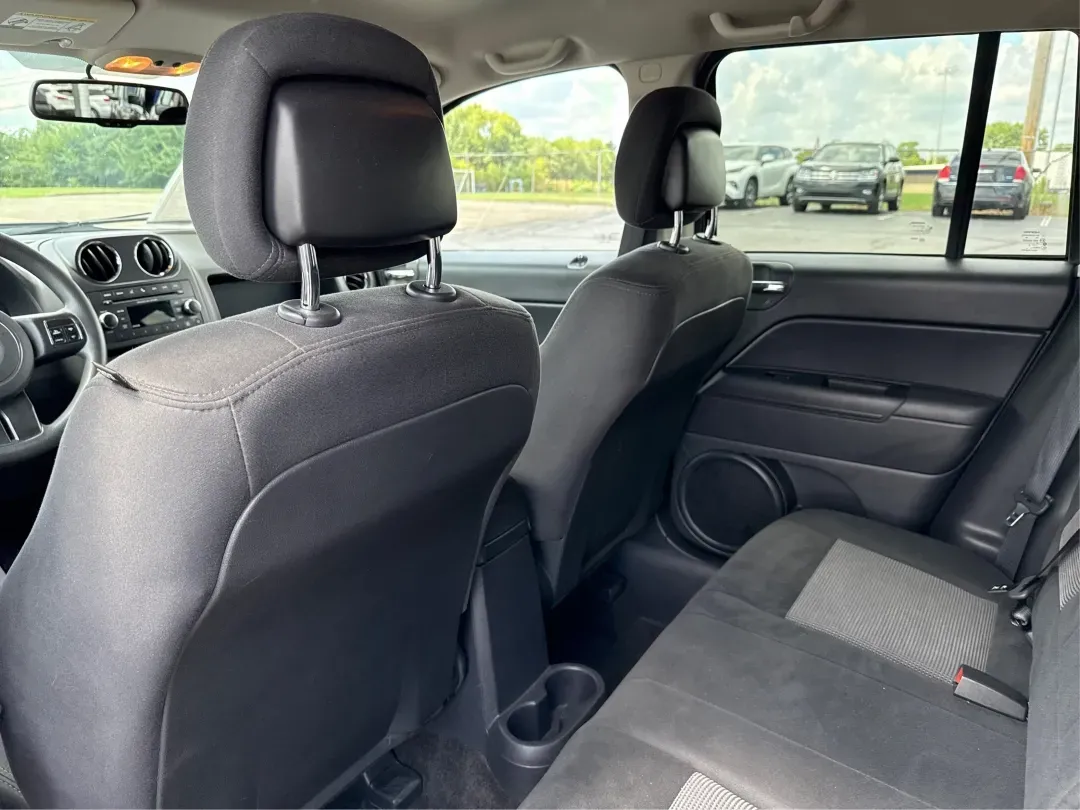 2014 Jeep Compass Sport (1C4NJDBB4ED) with an 2.4L I-4 DOHC engine, located at 1230 East Main St, Xenia, OH, 45385, (937) 908-9800, 39.688026, -83.910172 - 2014 Jeep Compass Sport - Photo#10