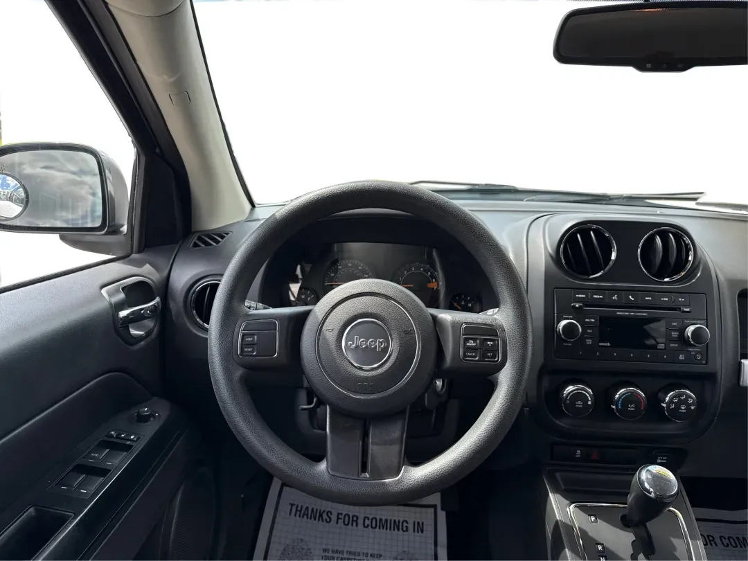 2014 Jeep Compass Sport (1C4NJDBB4ED) with an 2.4L I-4 DOHC engine, located at 1230 East Main St, Xenia, OH, 45385, (937) 908-9800, 39.688026, -83.910172 - 2014 Jeep Compass Sport - Photo#21