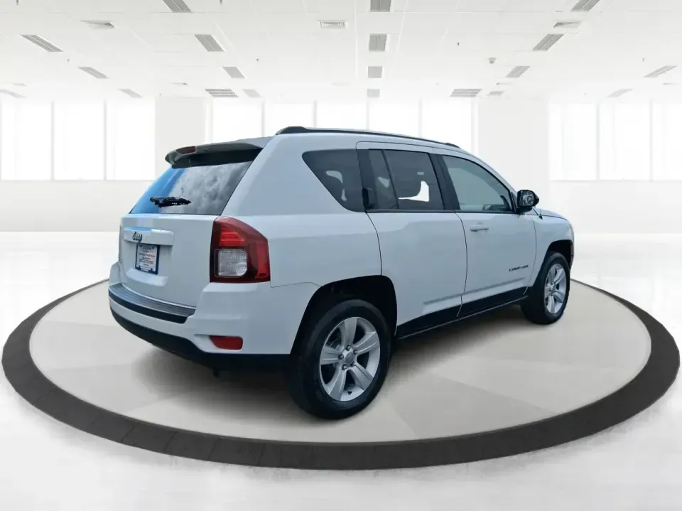 2014 Jeep Compass Sport (1C4NJDBB4ED) with an 2.4L I-4 DOHC engine, Automatic transmission, located at 4508 South Dixie Dr, Moraine, OH, 45439, (937) 908-9800, 39.689976, -84.218452 - **Experience Adventure with the 2014 Jeep Compass Sport at Advantage Car and Credit Xenia!** <br /> <br /> Are you ready to embrace the open road with a vehicle that combines comfort, capability, and style? The 2014 Jeep Compass Sport, available at Advantage Car and Credit in Xenia, Ohio, is the pe - Photo#2