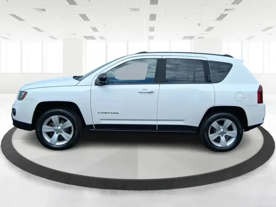 2014 Jeep Compass Sport (1C4NJDBB4ED) with an 2.4L I-4 DOHC engine, Automatic transmission, located at 4508 South Dixie Dr, Moraine, OH, 45439, (937) 908-9800, 39.689976, -84.218452 - **Experience Adventure with the 2014 Jeep Compass Sport at Advantage Car and Credit Xenia!** <br /> <br /> Are you ready to embrace the open road with a vehicle that combines comfort, capability, and style? The 2014 Jeep Compass Sport, available at Advantage Car and Credit in Xenia, Ohio, is the pe - Photo#5